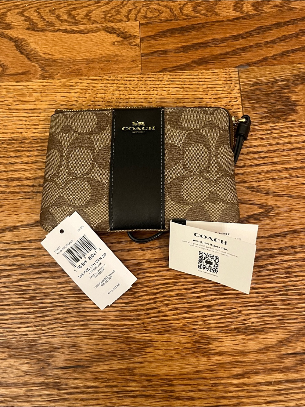 Coach Brown Monogram Wristlet with Black Stripe and Gold Hardware
